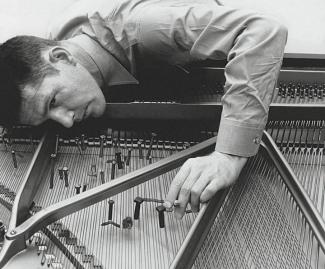 John Cage on piano