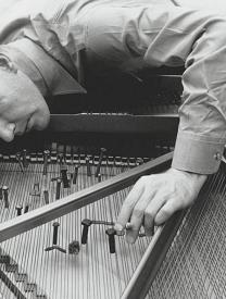 John Cage on piano